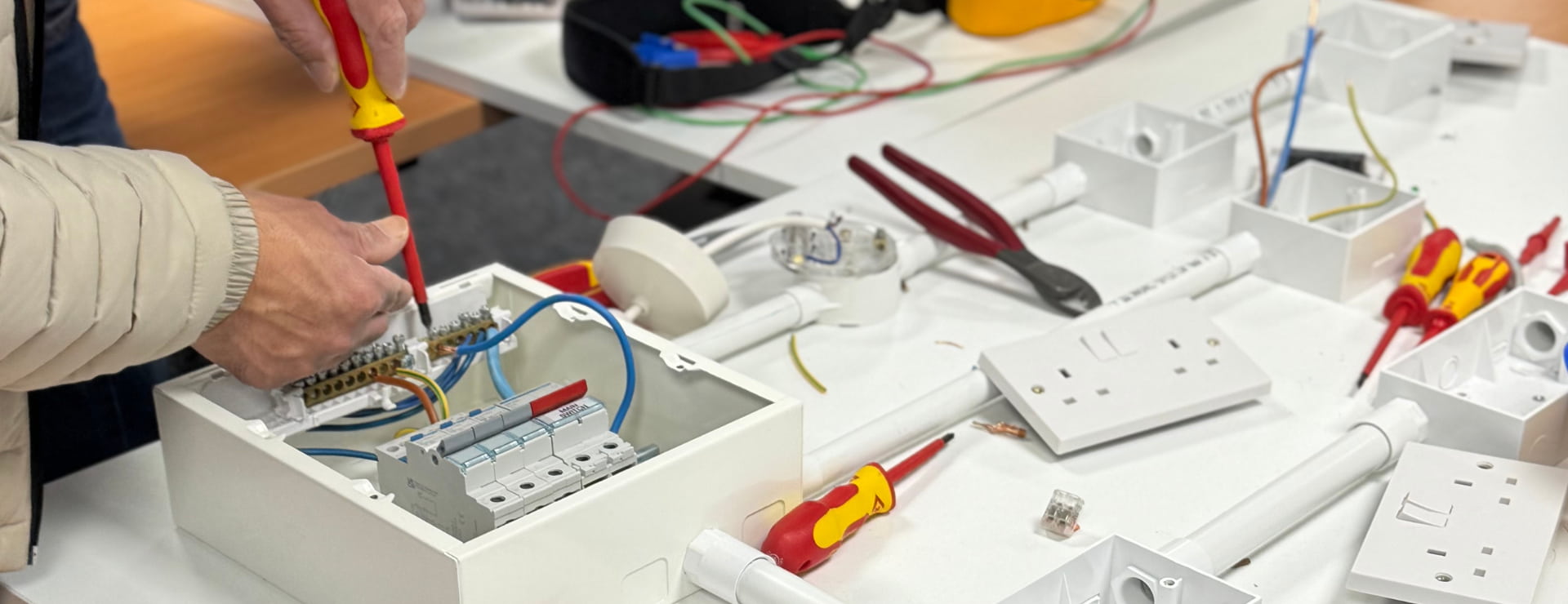 Electrical-student-working-in-attach-electical-wires